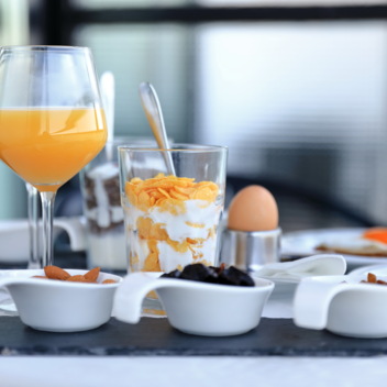 Served breakfast on a table in a hotel room
