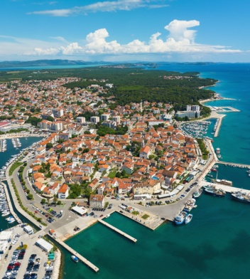 Aerial view of a coastal town and marina